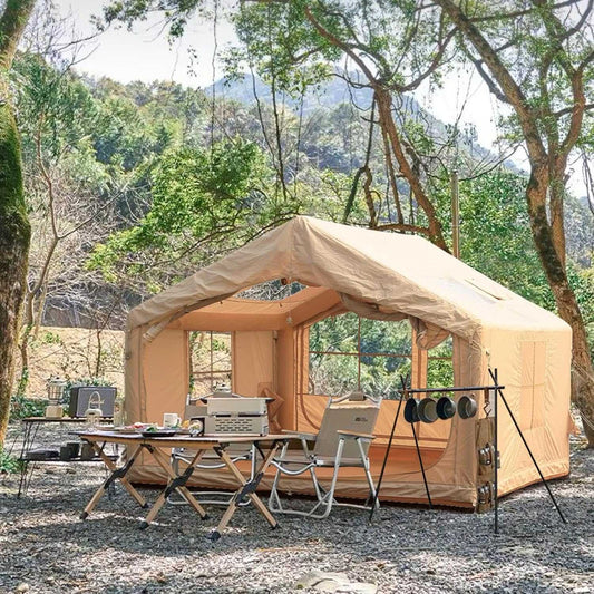 Inflatable Camping Tent for 6‑8 Person inflatable tent pitched by a lakeside campsite